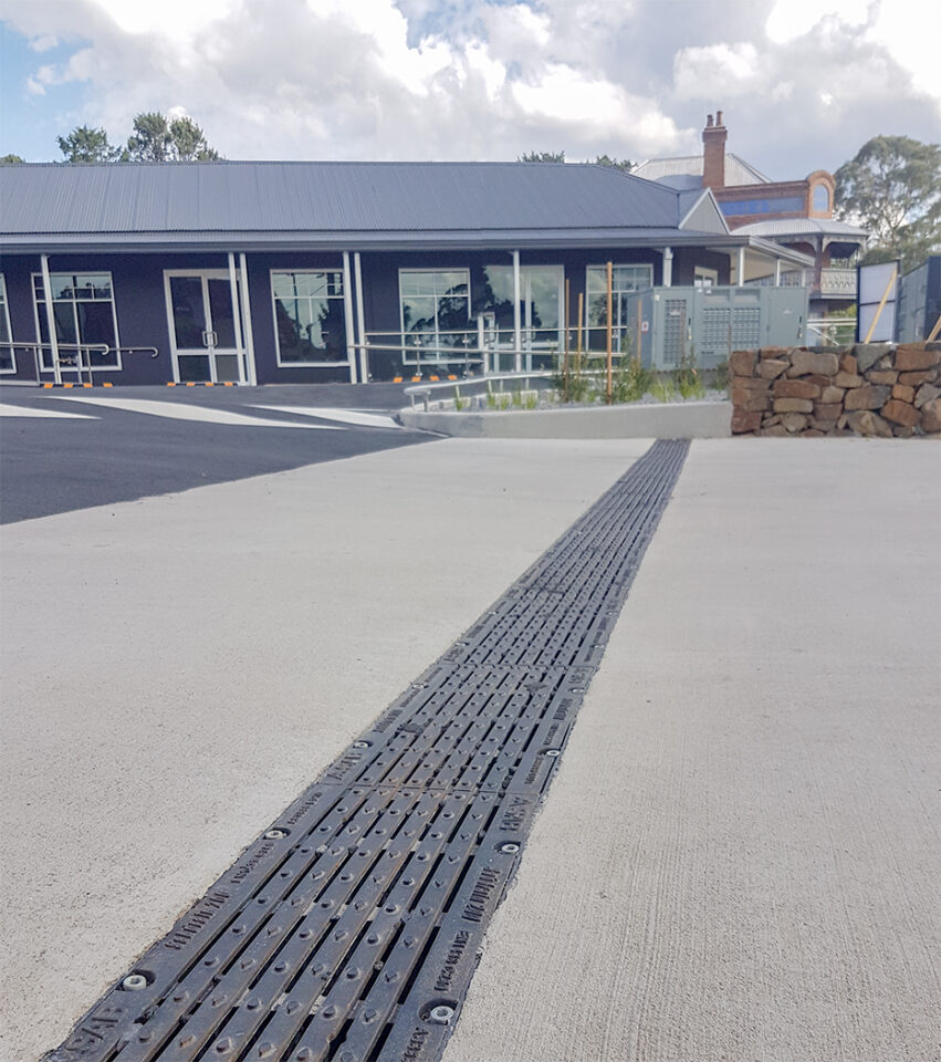 Cast iron grate installed in a carpark